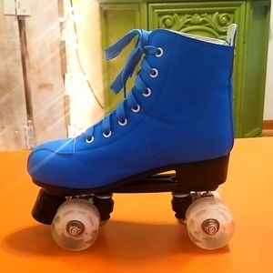 Electric blue rollerskates with light up wheels